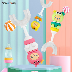 Brosse à dents en forme de U pour enfants Sakura, poils doux, design coloré, pour l'hygiène buccale des enfants - Product Image 1