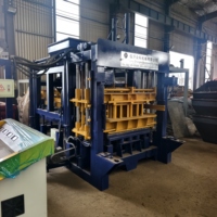 Machine à briques en béton multi-moules QT7-15 pour blocs creux et briques pleines