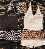 Lounge set voor dames met custom logo, luipaardprint, zachte katoenen haltertop en capri broek (2-delig)