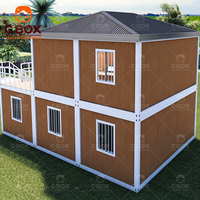 Casa Contenedor Prefabricada de Diseño Moderno y Personalizado Cbox, de Alta Calidad, de 2 Pisos, con Escaleras Exteriores, Material de Acero para Vivienda