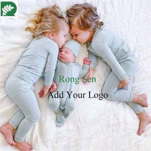 Abbigliamento per neonati <span class=keywords><strong>vestiti</strong></span> per neonati in tessuto naturale tinta unita maniche lunghe con volant 1 pigiama in bambù con cerniera per bambini - Product Image 1