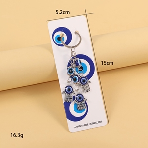 Nuovo Portachiavi con Piccolo Ciondolo a Forma di Palma, Elefante, Tacchino con Occhi Blu per Borsa e Auto - Product Image 3