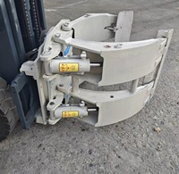 Chariot élévateur à fourche Heli Premium K30 de 3 tonnes avec pince ronde, équipé de pinces rondes d'origine, offrant une utilisation fluide et facile.