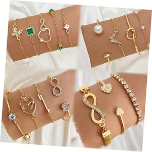 กำไลข้อมือคริสตัลรูปหัวใจสีพีช ZYO Fashion ประดับจี้รูปหัวใจผีเสื้อแบบเปิด กำไลรูปหัวใจอินฟินิตี้หลายชั้นสำหรับผู้หญิง เครื่องประดับ - Product Image 1