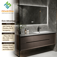 Ensemble de meubles de salle de bain modernes en bois massif OEM avec miroir LED argenté et égouttoir mural en cuivre pour la maison, le bar, la chambre et l'école