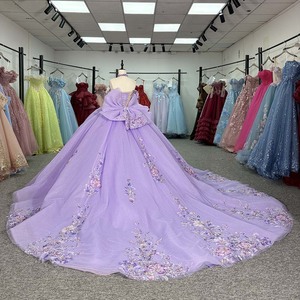 6947 Vestido de Quinceañera con Cuello de Flores, Ilusión de Hombros Descubiertos, Apliques Bordados y Estampado Floral, con Lazo y Cola Capilla - Product Image 3