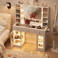 Coiffeuse blanche avec miroir Hollywood et armoire à éclairage RGB, table de maquillage intelligente avec plateau en verre et station de charge pour chambre à coucher