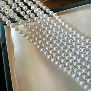 สร้อยคอมุกแท้สีขาวจากออสเตรเลีย ขนาด 10-11 มม. ทรงกลม แสงเงาสวยงาม มีตำหนิเล็กน้อย พร้อมแผ่นเงินแท้สำหรับเปลี่ยน ของขวัญ - Product Image 1