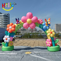 Arche de fleurs gonflable colorée avec des papillons pour la décoration de fêtes, de festivals et d'événements
