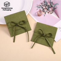 Pochette à bijoux de luxe en microfibre à rabat, petit sac en velours avec nœud, sac de rangement pour bagues, colliers et boucles d'oreilles, sac d'emballage cadeau pour bijoux