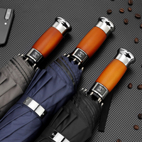 Parapluie pliable automatique classique à 10 baleines, revêtement noir, protection UV, poignée en bois robuste, matériau pongee imperméable