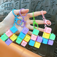 Porte-clés anti-stress en forme de macaron, détachables et assemblables librement, pour la réduction du stress (vente en gros)