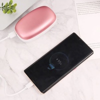 Banques d'alimentation chauffe-mains tendances avec lanière nouveaux produits centrales portables batterie mobile 10000mah pour l'hiver