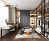 Chambre de luxe simple, moderne, écologique, dressing de grande capacité avec miroir d'habillage et porte en contreplaqué pour hôtel