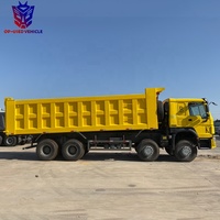 Sinotruk Howo 8x4 baru truk sampah berat Camion Benne Basculante Volquete Euro 5 standar emisi Diesel weiyai mesin kiri