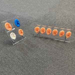 Soporte de exhibición de silicona flexible para audífonos, modelo de seis orejas HappyHearing - Product Image 1