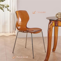 Chaise de salle à manger en acier transparent de style nordique, pieds en métal, populaire sur Internet, dossier simple, design minimaliste pour un usage domestique, petits appartements