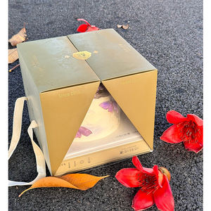 Boîte à pâtisserie élégante et luxueuse avec un centre en plastique transparent et un couvercle rabattable fixé au fond, ouverture double face - Product Image 1