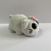 Peluche populaire du hamster triste avec bouton poussoir intégré pour faire un meme, avec de grands yeux et un nœud rose