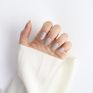 AIERFEI 24 piezas elegante avanzado Color gris Color sólido corto ovalado corto redondo uñas postizas Gel suave Prensa en suministros para uñas - Product Image 1