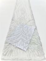 Tissu de dentelle perlée de luxe, tissu de dentelle perlée blanche avec des cristaux et des paillettes, dentelle de mariage exclusive perlée