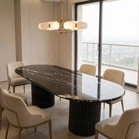 Table à manger ovale moderne en marbre Nero Marquina, base cannelée artistique, mobilier de luxe en pierre, table sur piédestal décorative