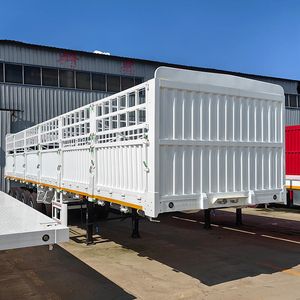 Semirremolque de plataforma alta de 3 ejes de 5-10 toneladas con carrocería de estacas, paredes laterales reforzadas, valla y neumáticos 12R22.5 para transporte de carga pesada - Product Image 1