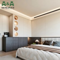 Armoire de chambre moderne sur mesure avec portes blanches sans poignées, placards en noyer foncé, tringle de suspension ouverte et tiroirs latéraux