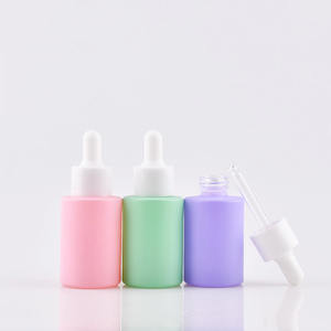 Frasco cuentagotas de vidrio de aceite esencial Suero 1oz 2oz 30ml Frascos cuentagotas de vidrio rosa azul Botella de aceite esencial - Product Image 1