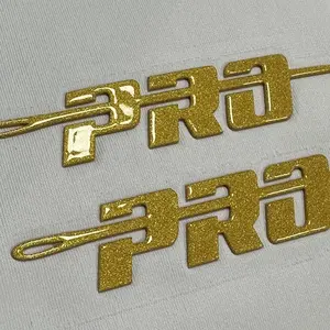 Großhandel Custom 3D Gloss Gold Glitter Logo Silikon Hoch dichte Wärme übertragung Drucke ti ketten
