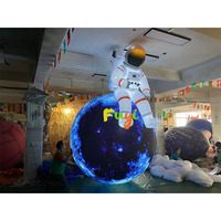 Sculpture d'astronaute gonflable géante Fuyi personnalisée avec souffleur d'air pour centre commercial, fête, événement thématique, décoration commerciale