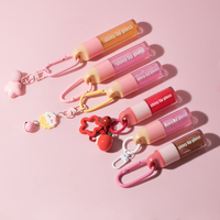 Vente en gros 8ml hydratant crémeux personnalisé lèvre plus dodue brillant porte-clés marque privée Juciy teinte pour les lèvres crème solaire brillant teinte pour les lèvres MSDS
