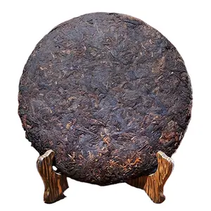 Factory Bulk Price Yunnan Puerh Ripe Tea Cake Relieves Constipation Regulates The Stomach Protects The Teeth Warms The Body