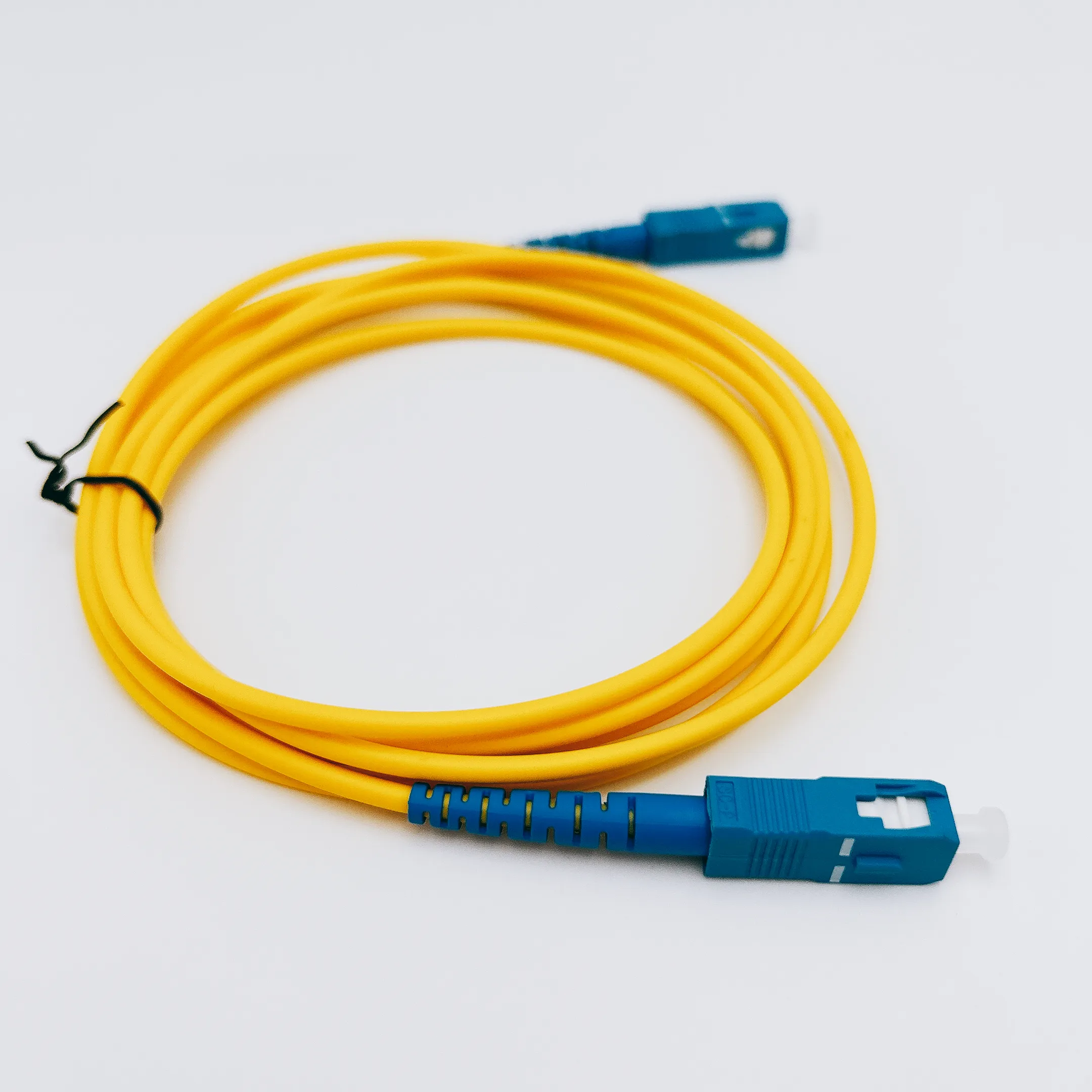 Fornitura di fabbrica Simplex Outdoor G657A1 100 m 200m fibra Drop Patch Cord Sc Upc a Sc Upc Kabel Ftth 100 metri cavi di comunicazione