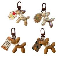 En gros, Breloques et accessoires de porte-clés en résine 3D, motifs dessin animé, jouets mignons style anime, chien ballon, légers et tendance, pour sacs de filles et femmes