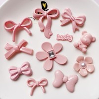 Breloques plates à dos plat en strass rose, motifs nœud et étoile, style Kawaii, pour coques de téléphone, coques d'iPad, accessoires capillaires, décorations de chaussures et loisirs créatifs DIY