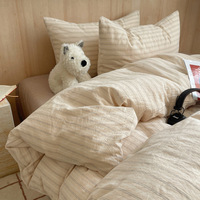 Parure de lit 4 pièces en coton 100% teint en fil, lavée, antistatique, rayée, 600 fils/cm², design minimaliste de style japonais, pour un sommeil pur.