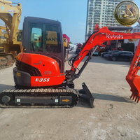 Mini-excavatrice compacte d'occasion Kubota U35 sans queue, 3,5 tonnes, équipée d'un marteau brise-roche et d'un pince de préhension
