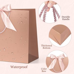 Sacs cadeaux de mariage de luxe durables, imperméables et écologiques en papier blanc avec poignée en ruban, impression de logo personnalisé pour petites entreprises - Vente en gros - Product Image 3