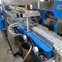 Machine à découper le verre capable de couper des tubes en verre d'un diamètre de 25 à 120 mm, automatiquement et à très grande vitesse, machine de découpe automatique de tubes en verre