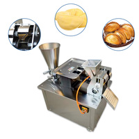 Machine automatique pour la fabrication de raviolis, samosas, empanadas, momos et dumplings