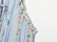 Nouvelle robe mini décontractée pour femme 2026, imprimé floral, style rétro chic, sans manches, coupe ajustée.