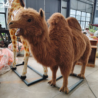 Grand chameau bactrien artificiel animatronique avec tête mobile, bouche qui mâche et sons réalistes pour la décoration de zoos et de parcs à thème désertiques