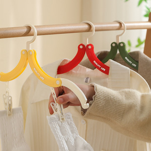 Perchero plegable portátil con clips para viajes y uso doméstico, organizador de ropa con gancho rectangular - Product Image 1