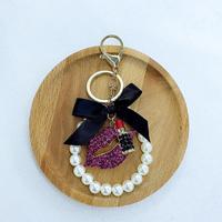 Nouveautés Style Designer Porte-clés en métal avec pendentif lèvre incrusté de diamants et strass, tridimensionnel, pour sac à rouge à lèvres, petit modèle
