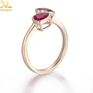 Bague d'éternité classique personnalisable en or jaune 10K avec pierre précieuse de laboratoire rouge Alexandrite, bijoux fins pour mariage - Product Image 1