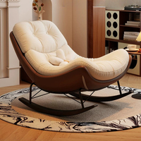 Fauteuil à bascule minimaliste bicolore, ergonomique, avec dossier capitonné en tissu, en métal noir, pour la maison et l'intérieur