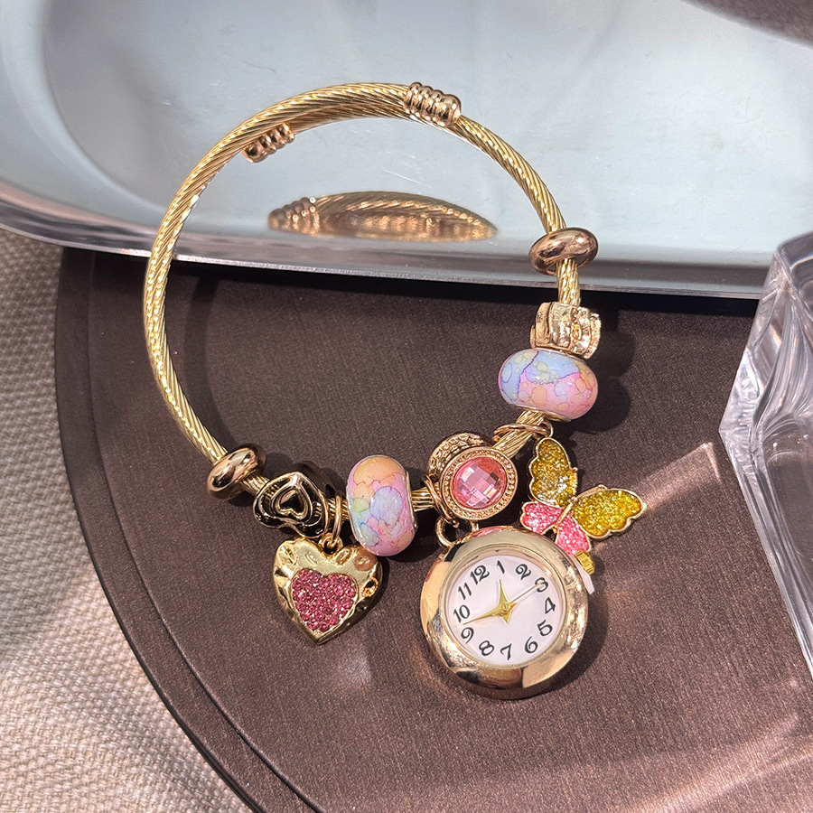 Bracelet coeur papillon doré rose