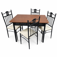 Table à manger rectangulaire avec 4 chaises rembourrées, cadre en métal noir ajouré et sculpté pour cuisine et salle à manger