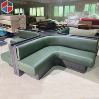Banquette haut de gamme en bois de noyer noir avec assise en cuir vert en forme de X pour restaurant et café